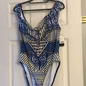 Kenneth Cole one piece swim suit with tummy toner